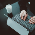 An image depicting a person working with a laptop, representing the core services offered by Sprobuj Digital Agency and their commitment to delivering effective digital solutions.