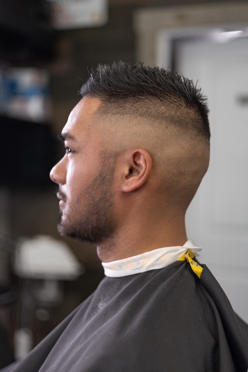 A captured moment from the branding-focused photoshoot orchestrated by Sprobuj Digital Agency for FiveStar Barbershop, emphasizing their unique brand identity and style.