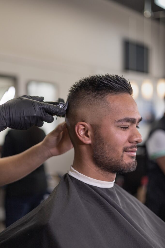 A captured moment from the branding-focused photoshoot orchestrated by Sprobuj Digital Agency for FiveStar Barbershop, emphasizing their unique brand identity and style.