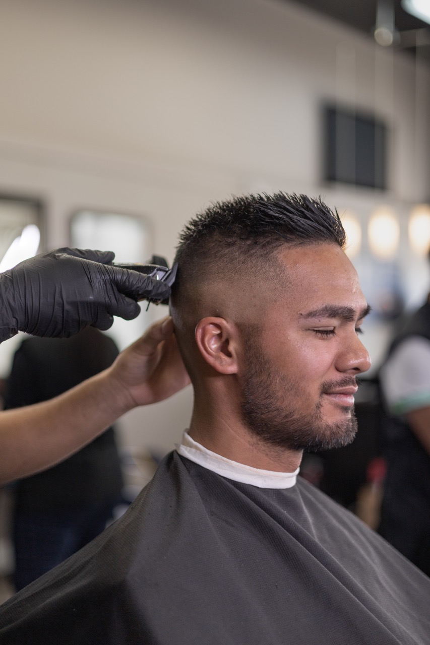 A captured moment from the branding-focused photoshoot orchestrated by Sprobuj Digital Agency for FiveStar Barbershop, emphasizing their unique brand identity and style.