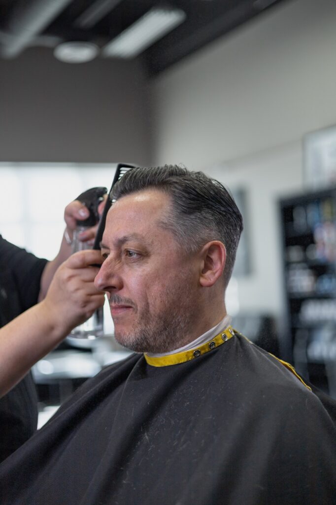 A captured moment from the branding-focused photoshoot orchestrated by Sprobuj Digital Agency for FiveStar Barbershop, emphasizing their unique brand identity and style.