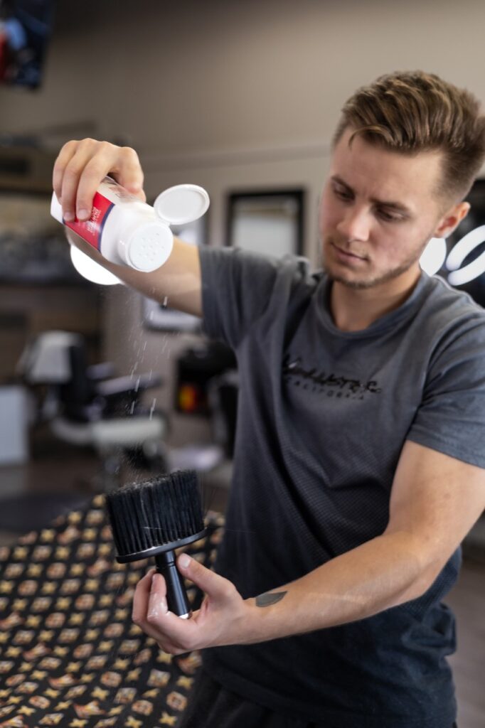 A captured moment from the branding-focused photoshoot orchestrated by Sprobuj Digital Agency for FiveStar Barbershop, emphasizing their unique brand identity and style.