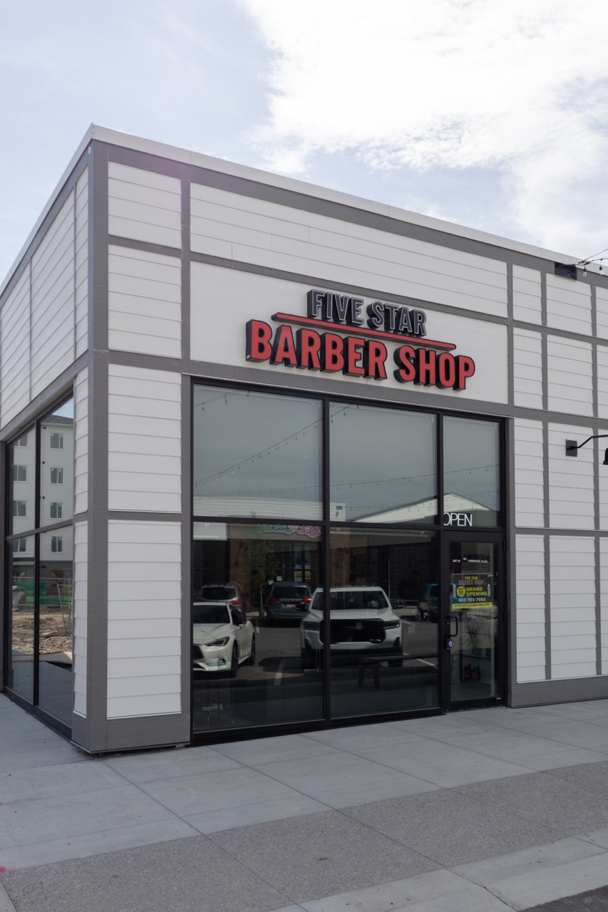 A snapshot from the photoshoot conducted by Sprobuj Digital Agency to commemorate the opening of FiveStar Barbershop's new location, capturing the excitement and energy of the event.