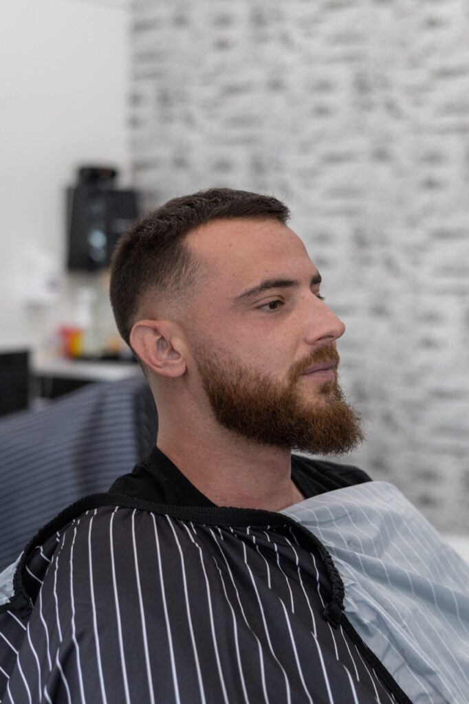 A snapshot from the photoshoot conducted by Sprobuj Digital Agency to commemorate the opening of FiveStar Barbershop's new location, capturing the excitement and energy of the event.